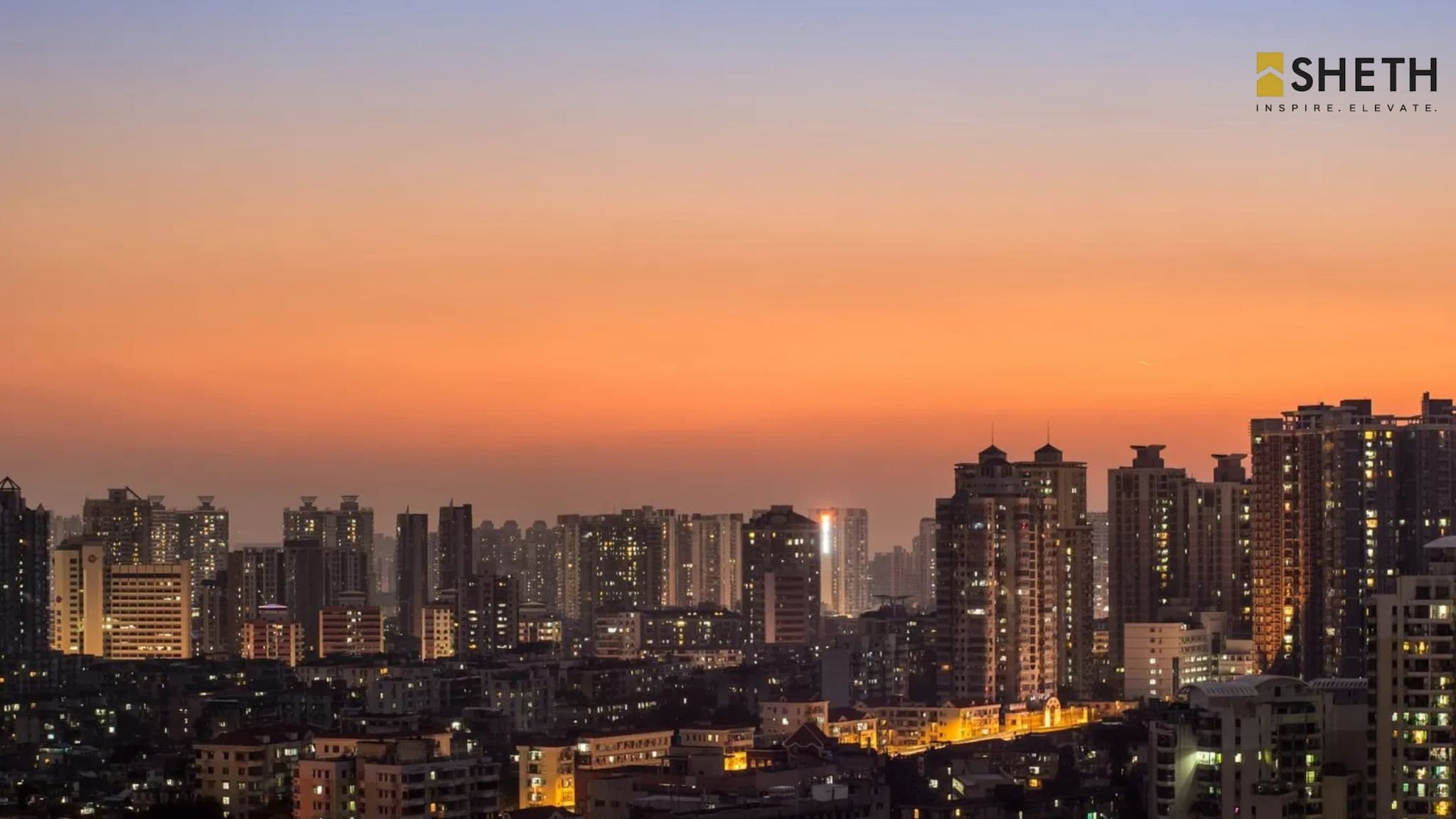 Mumbai skyline at sunset with premium residential towers